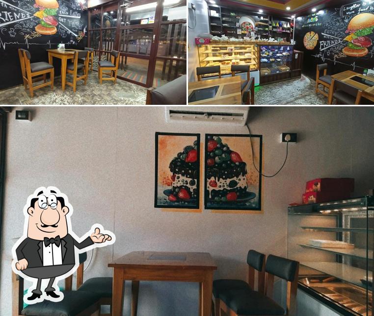 Take a seat at one of the tables at Hot Dessert Cafe & Bakery