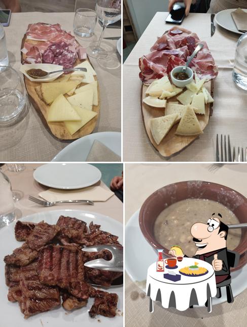 Piatto di formaggi al Osteria Punto e a Capo