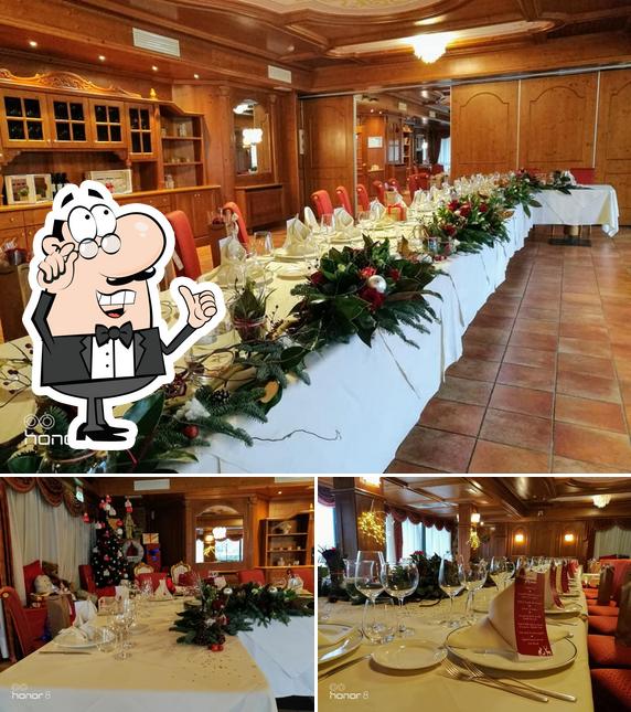 Siediti a un tavolo di Chalet Al Lago