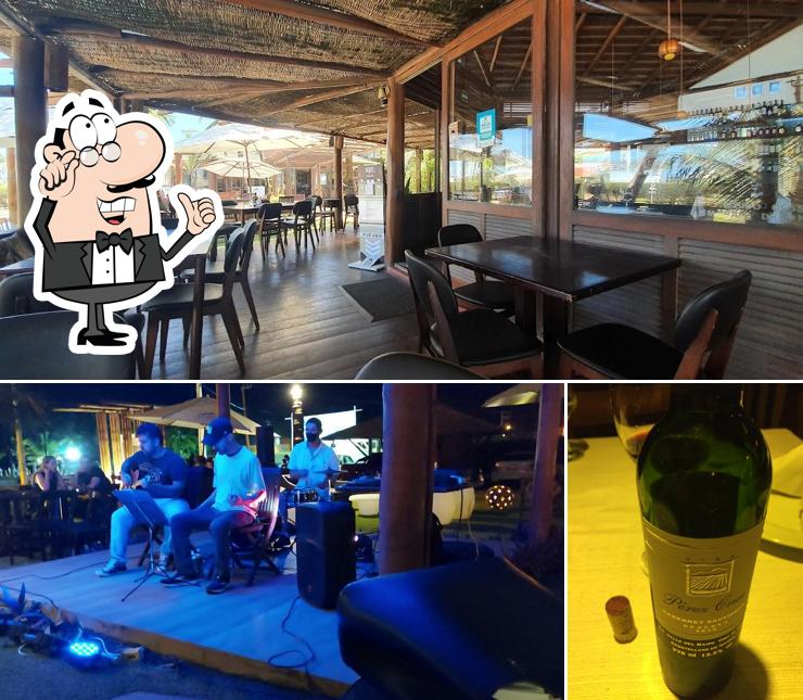 Esta é a imagem mostrando interior e álcool no Restaurante Sollo