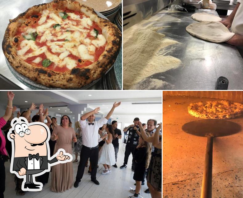 Questa è la foto che presenta la interni e cibo di Komodo Eventi Qualiano