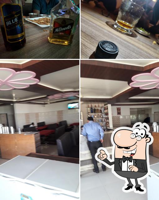 Check out the picture depicting interior and drink at Hotel Shraddha Restaurant and Bar
