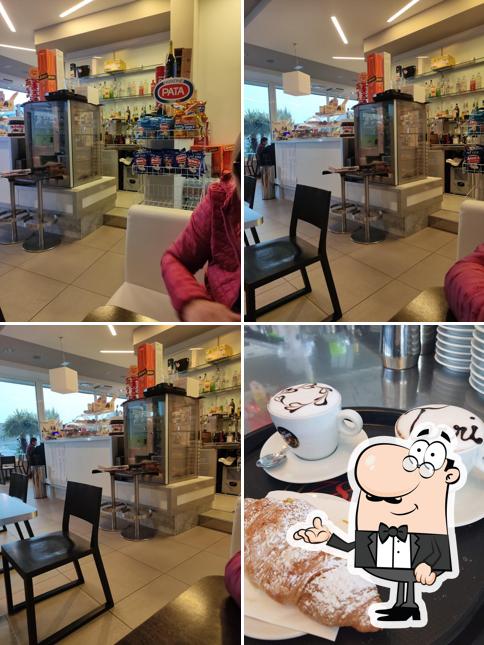Dai un'occhiata agli interni di White Coffee