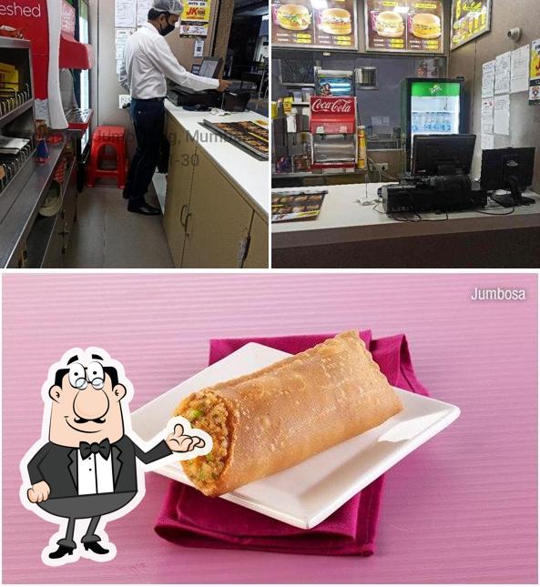 This is the photo depicting interior and food at Jumboking