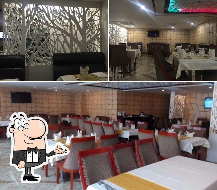 The interior of Oleev Multicuisine - Hotel The Raso