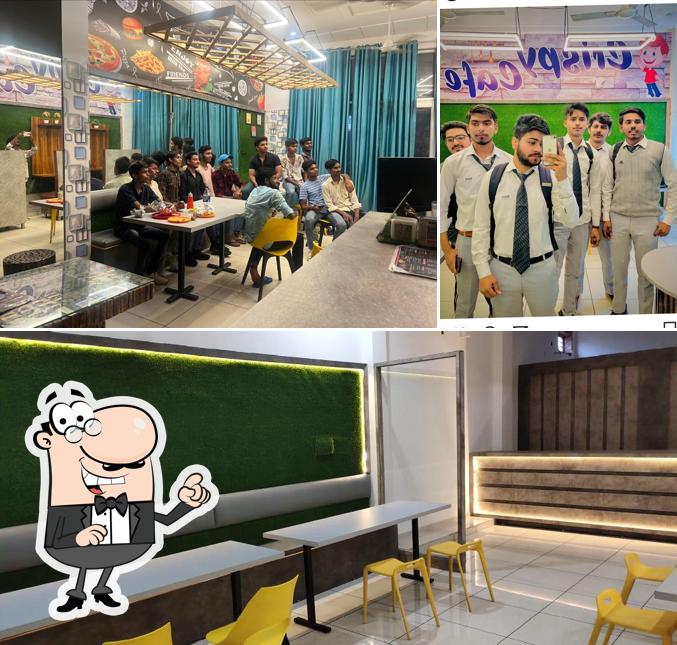 Take a seat at one of the tables at CRISPY CAFE