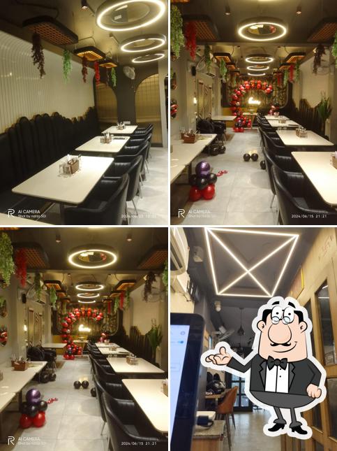 Take a seat at one of the tables at Patna Foodies Club