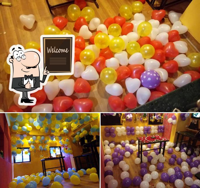 Look at this image of MeeT N TreaT Coffee Shop