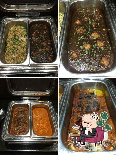 Take a seat at one of the tables at Barbeque Adda