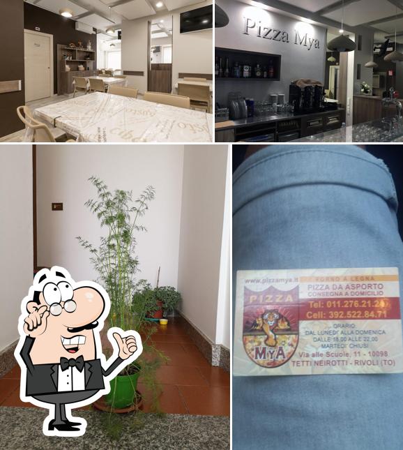 Dai un'occhiata agli interni di Pizza Mya