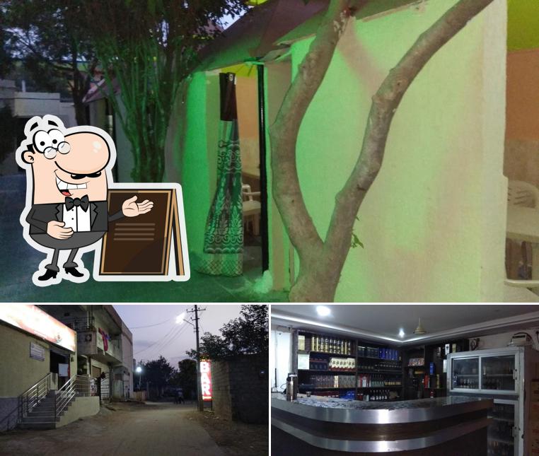 The photo of Sri Woodland Bar & Restaurant’s exterior and bar counter