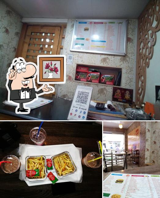 Take a look at the picture displaying interior and fries at Ginni Buns The Mall