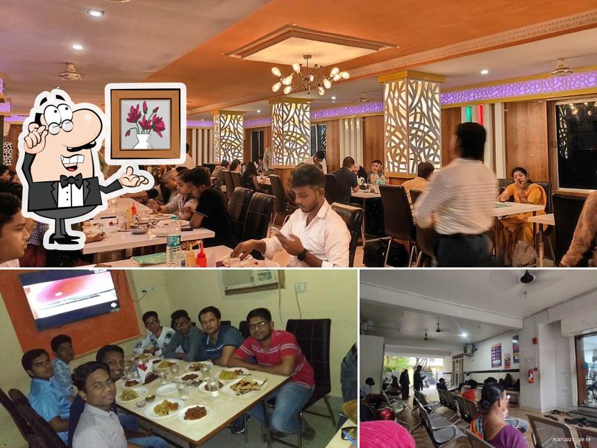 Take a seat at one of the tables at Radha Restaurant