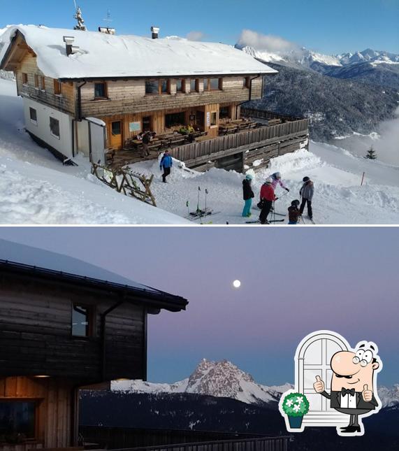 Puoi goderti l'aria fresca da seduto all'esterno di Rifugio Col d'la Tenda