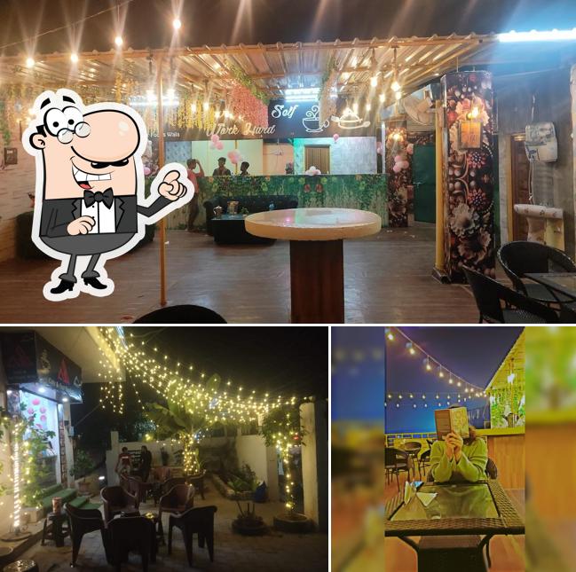 Take a seat at one of the tables at LLB Cafe & Fast Foods Wala