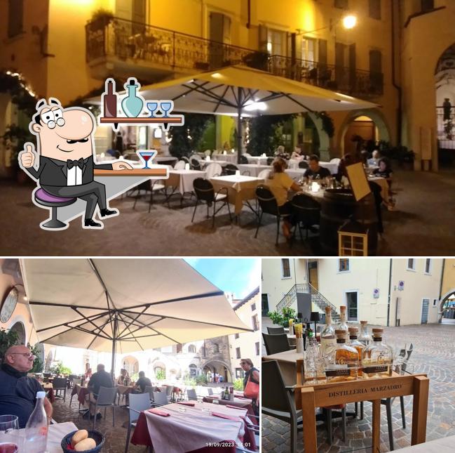 Siediti a un tavolo di Osteria Il Gallo