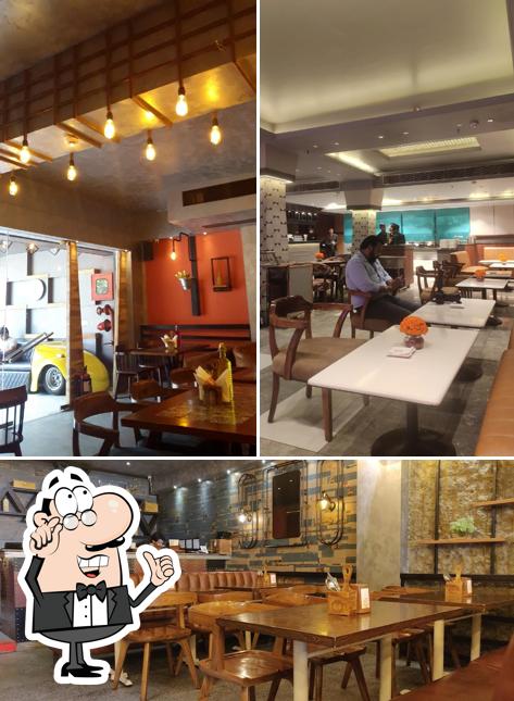 The interior of Sandoz Restaurant - Rajouri Garden