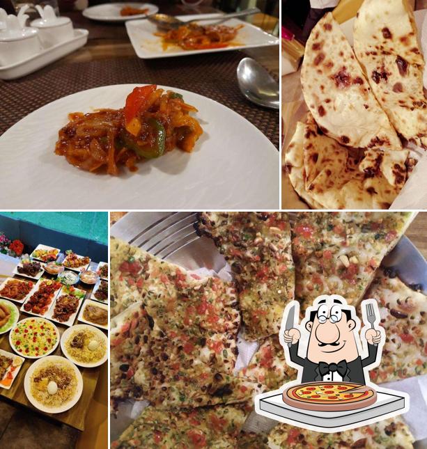 Pick pizza at Sidra Restaurant