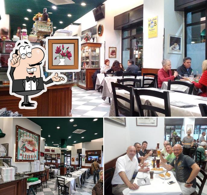Siediti a un tavolo di Pizzeria ai 4 Assi