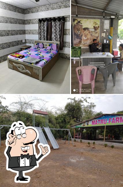 The photo of interior and play area at Matru Farm And Restaurant