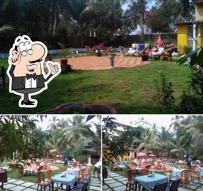 Check out the picture depicting interior and exterior at Georgies Place Wooden Home Stay Bar n Restaurant