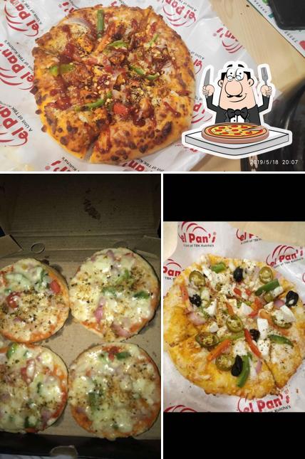 Try out pizza at TBK Kulcha's