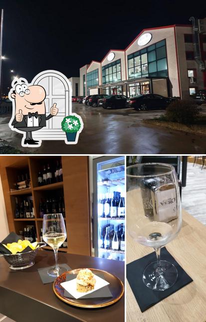 Questa è la foto che presenta la esterno e vino di Cicchetteria L'officina
