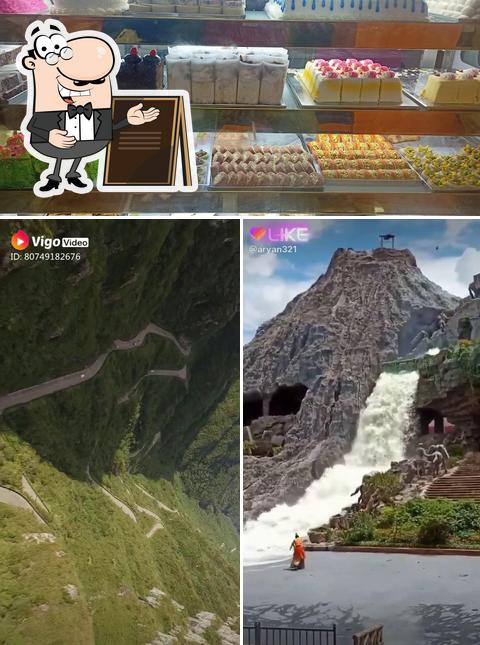 Take a look at the photo displaying exterior and cake at Kumar Hotel