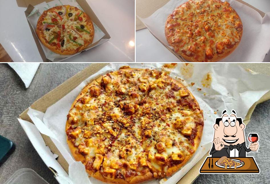 Try out pizza at Custom Grub