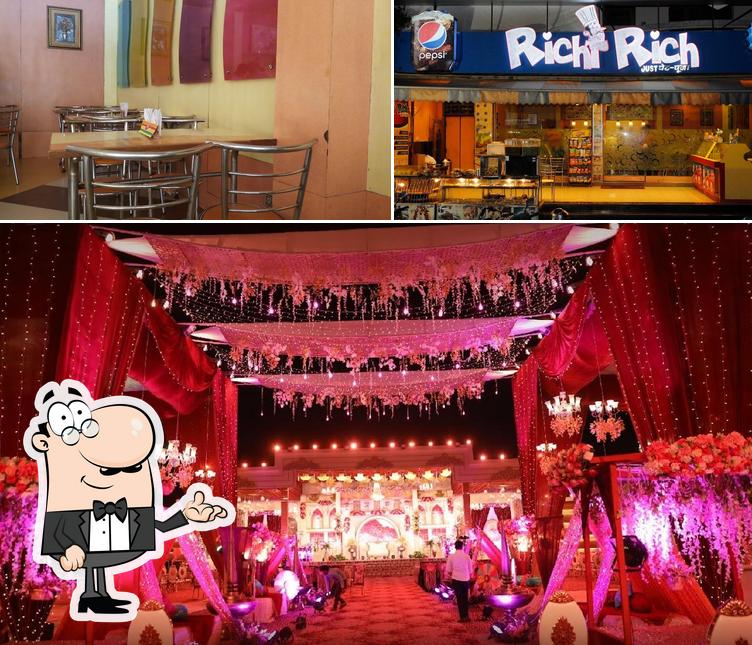 Take a seat at one of the tables at Richi Rich Restaurant
