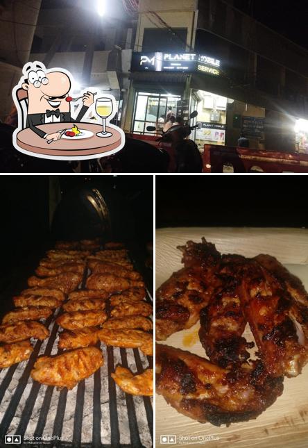 Check out the image depicting food and interior at Bullet chicken