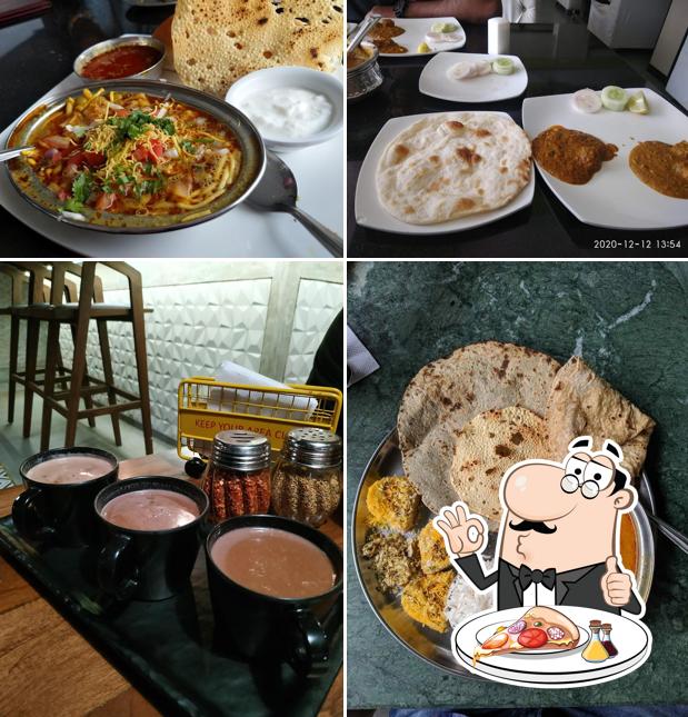 Try out pizza at Bhandara Restaurant Balewadi