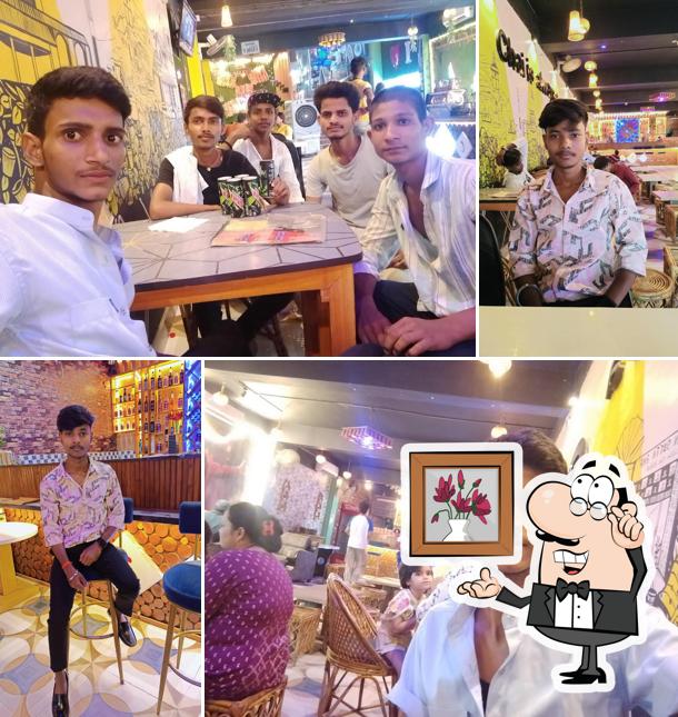 Take a seat at one of the tables at Chai Sutta bar