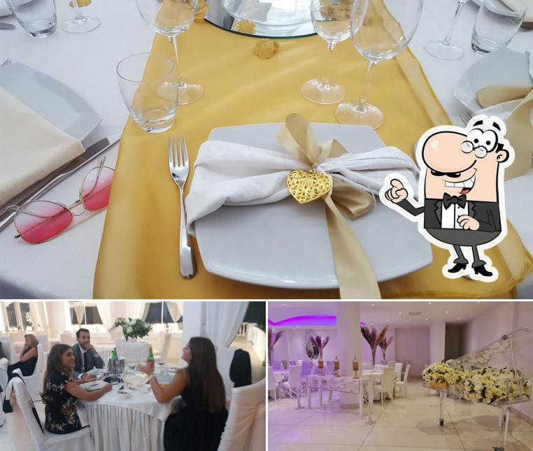 Siediti a un tavolo di Villa Ristorante Le Chateau
