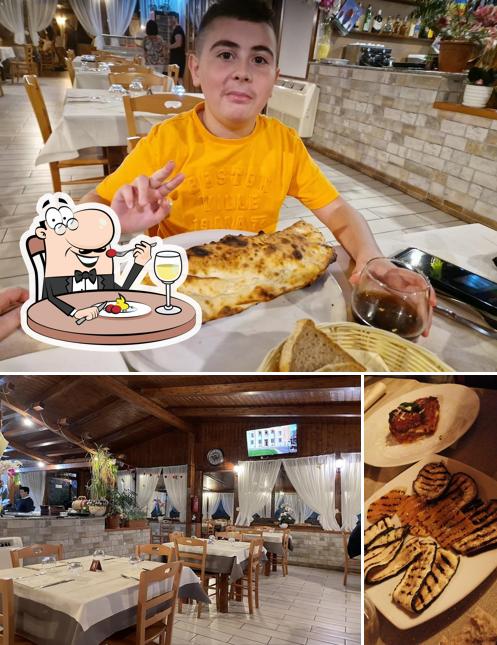 Ristorante pizzeria La Dacia si caratterizza per la cibo e interni