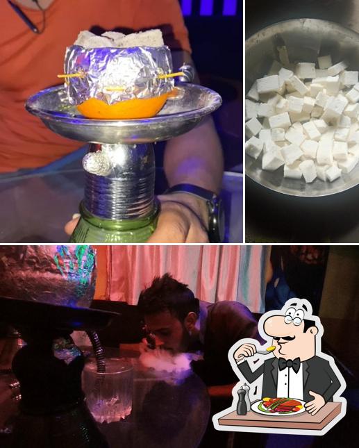 Among various things one can find food and bar counter at The Moksha