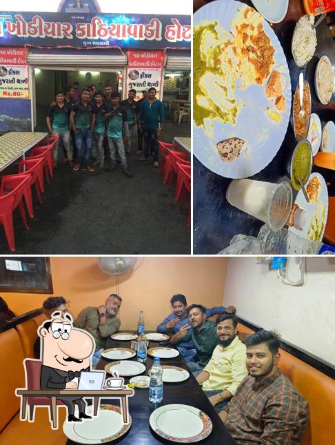 Among different things one can find interior and food at Jay Khodiyar Kathiyawadi Hotel