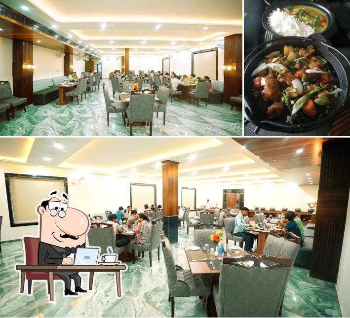 The photo of interior and food at Raghunandan Restaurant