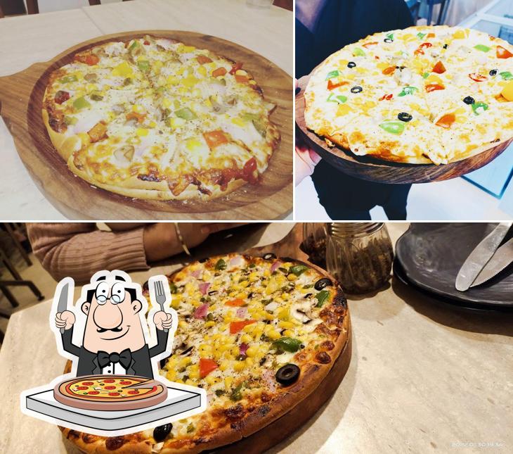 Try out pizza at The London Shakes