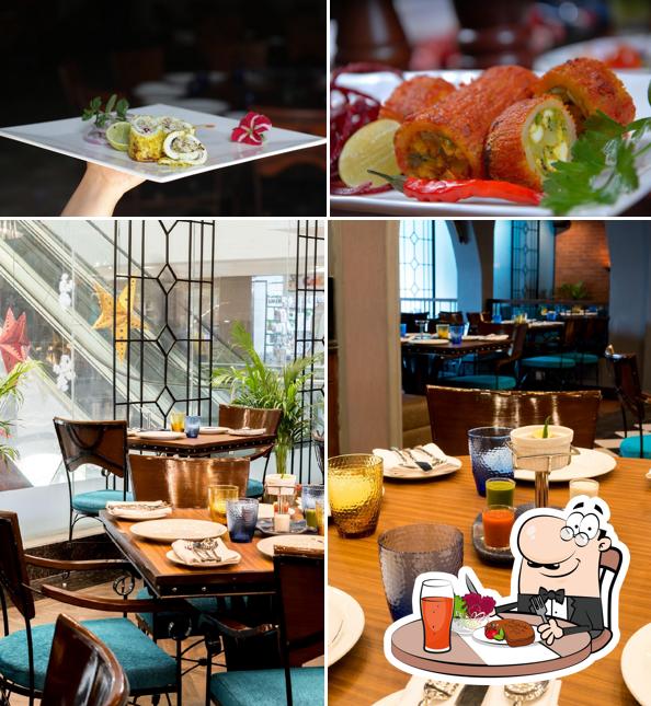 The image of dining table and food at The Great Kabab Factory Express