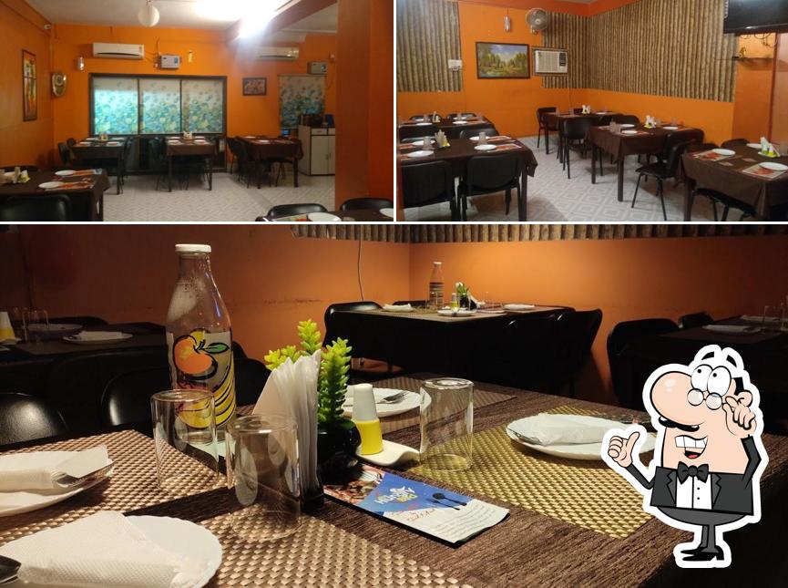 Take a seat at one of the tables at The Hungry Bird Restaurant