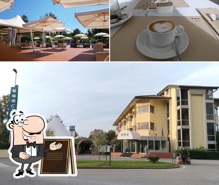 La foto della esterno e bevanda di UNA Hotels Forte dei Marmi