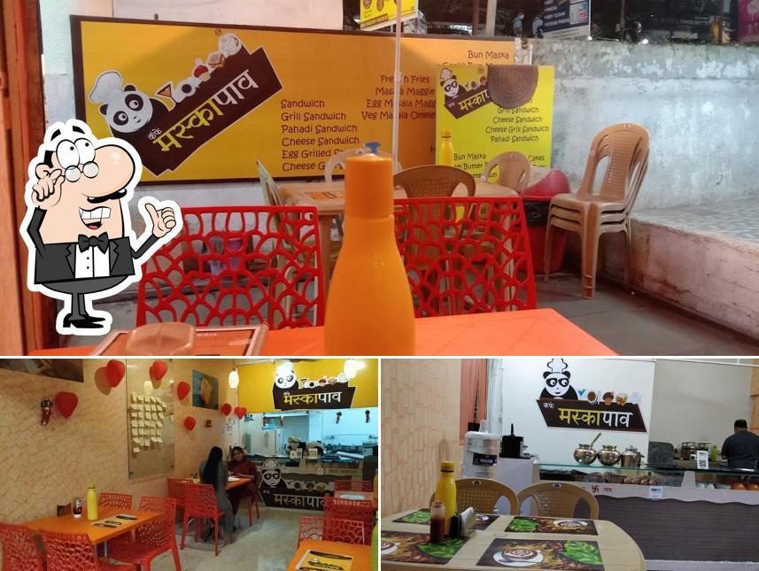 Take a seat at one of the tables at Cafe Maska Pav (Cloud Kitchen)
