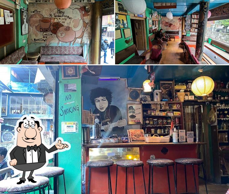 Take a seat at one of the tables at Dylan's Toasted & Roasted Coffee House-Best Coffee House/Pioneer of Real Coffee/Most Popular Cafe For World Famous