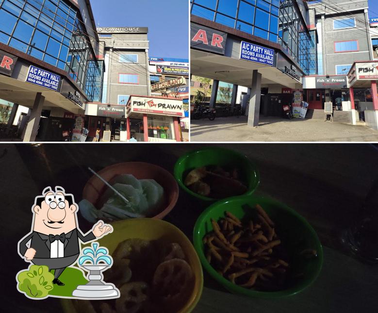 This is the picture displaying exterior and food at Ocean Bar