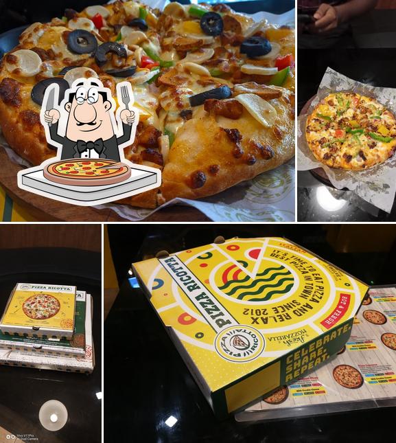 Try out pizza at Pizza Ricotta Tirur