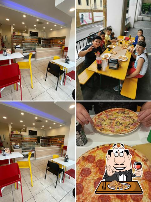 Prenditi una pizza a Pizzeria Quadrilatero