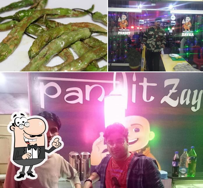 This is the image displaying interior and seafood at Pandit Zayka