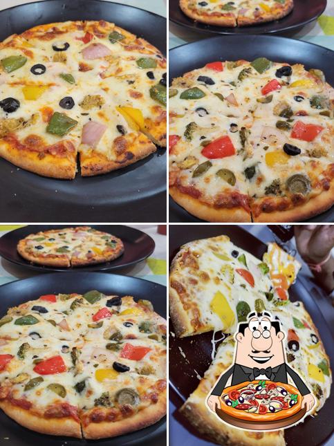 Get pizza at IceKraft & The Secret Kitchen