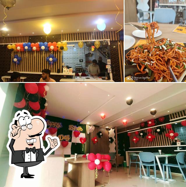 The interior of Mesmerizing Cuisines : Cafe & Resto